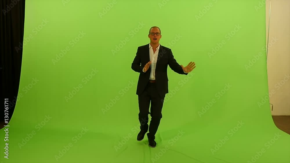 full body shot of man dancing isolated against green screen background. full body shot of man dancing isolated against green screen background.