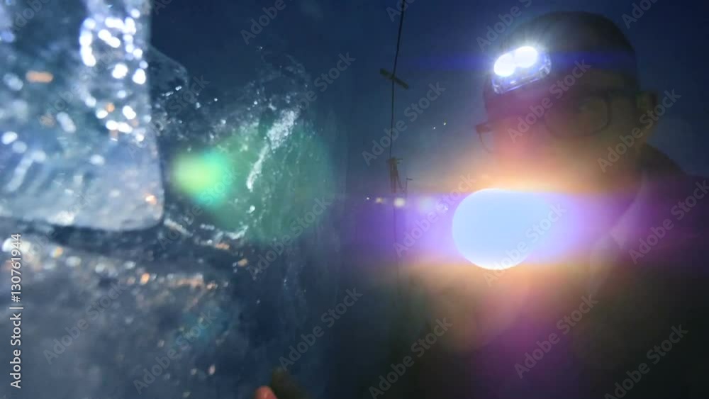 adventure background of person using flashlight to discover ice glacier cave. adventure background of person using flashlight to discover ice glacier cave.