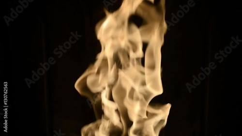 TURIN, ITALY-December 12, 2016: Fire with black background inside a burning stove in Turin, Italy