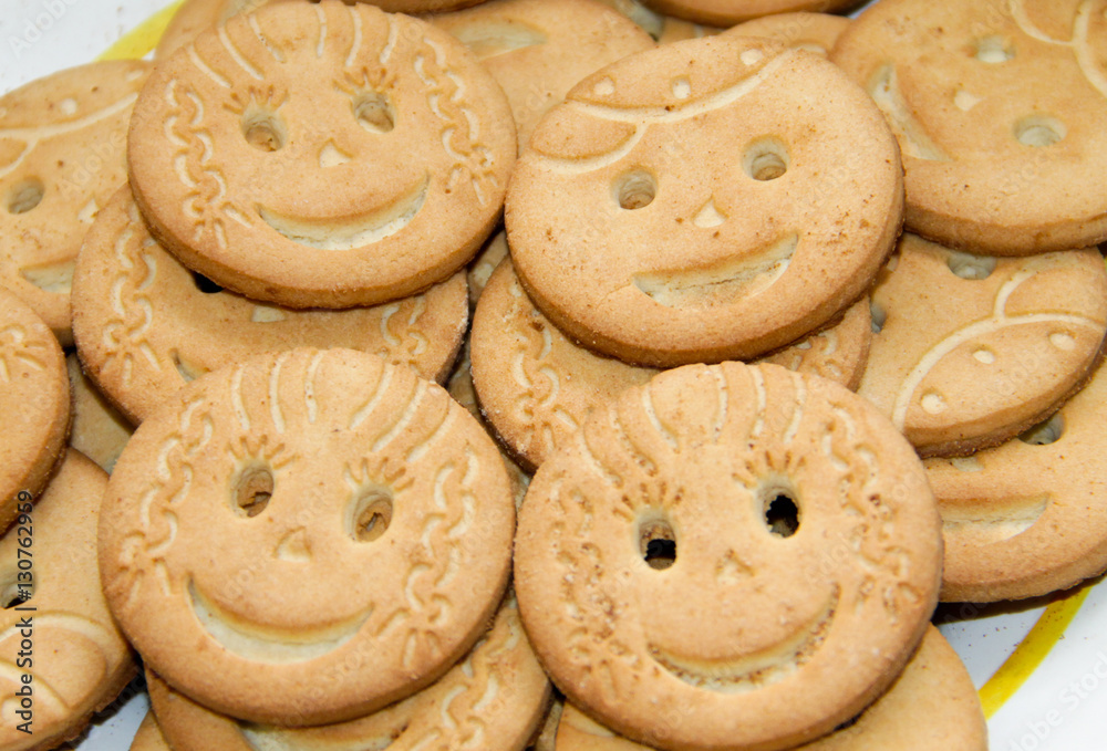Background of round smiling cookies Background of round smiling cookies