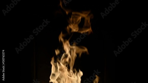 TURIN, ITALY-December 12, 2016: Slow Motion of Fire with black background inside a burning stove in Turin, Italy