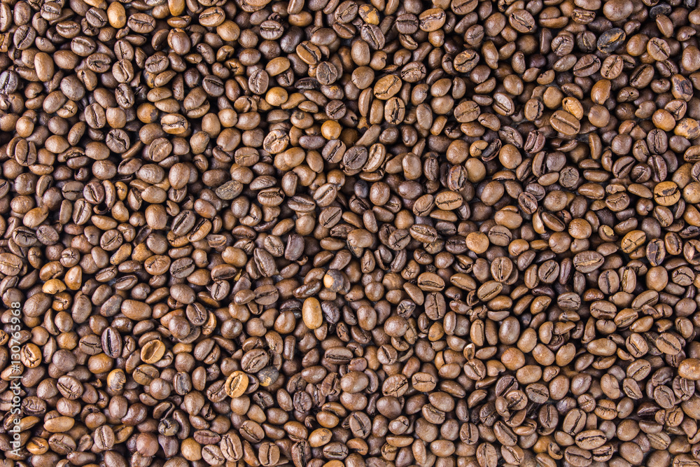 Coffee beans on wooden background are the table top view concept Coffee beans on wooden background are the table top view concept