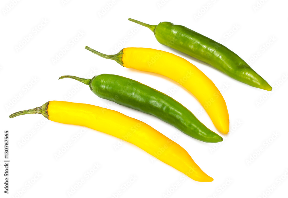 Colorful chili peppers on a white background