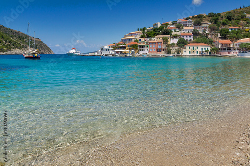 Clean waters of beach of Assos village and beautiful sea bay, Kefalonia, Ionian islands, Greece