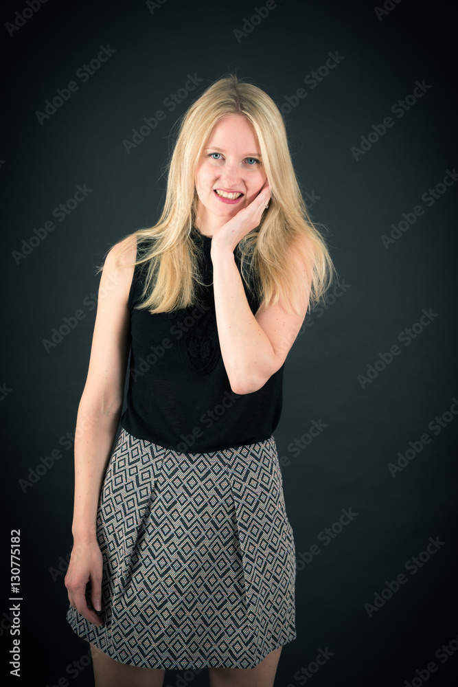 Beautiful woman doing different expressions in different sets of clothes: toothache Beautiful woman doing different expressions in different sets of clothes: toothache