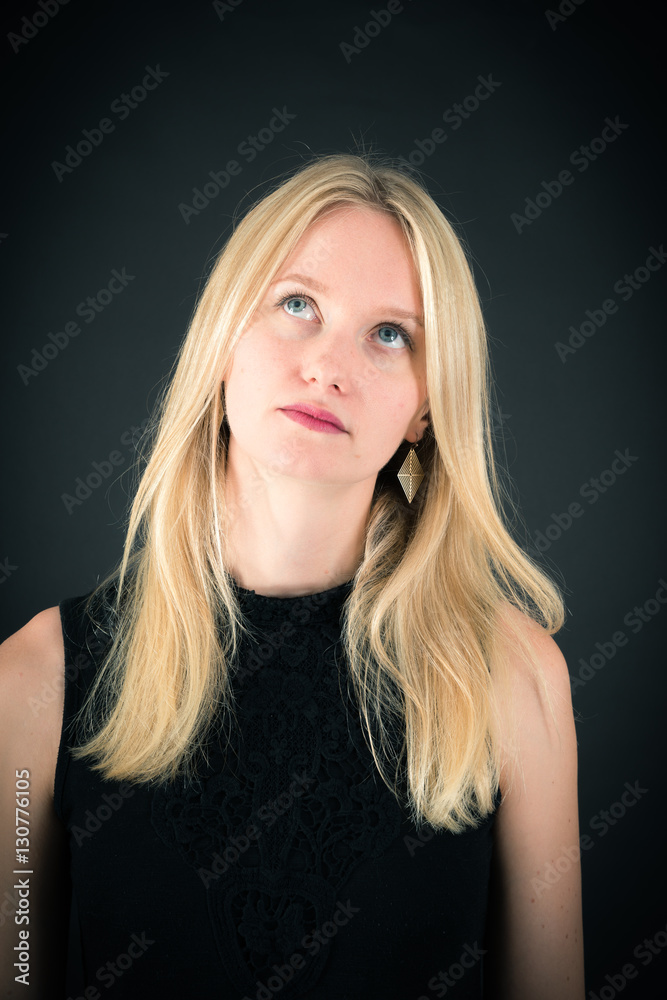 Beautiful woman doing different expressions in different sets of clothes: thinking Beautiful woman doing different expressions in different sets of clothes: thinking