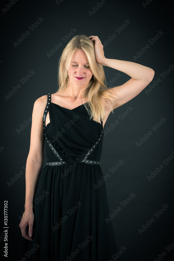Beautiful woman doing different expressions in different sets of clothes: headache Beautiful woman doing different expressions in different sets of clothes: headache
