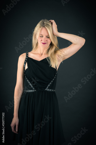 Beautiful woman doing different expressions in different sets of clothes: headache