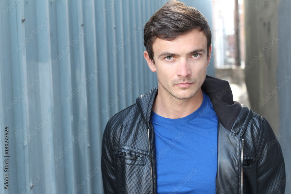 Serious Handsome Man Isolated in Alleyway Serious Handsome Man Isolated in Alleyway