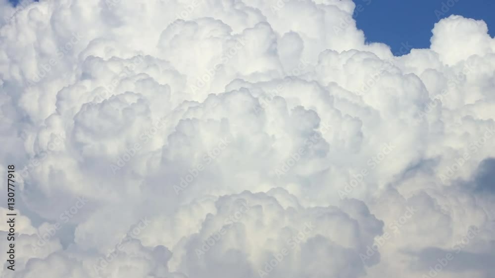 Time Lapse, Thick mass of white, fluffy, bubbling cumulous storm clouds Time Lapse, Thick mass of white, fluffy, bubbling cumulous storm clouds