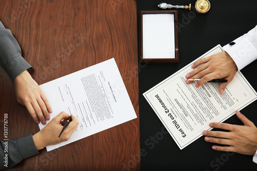 Woman and notary public sig...
