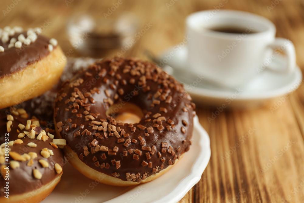 Plate with tasty donuts, closeup