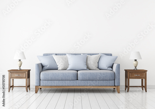 Livingroom with fabric sofa, pillows and lamps on empty wall background. 3D rendering. © marina_dikh