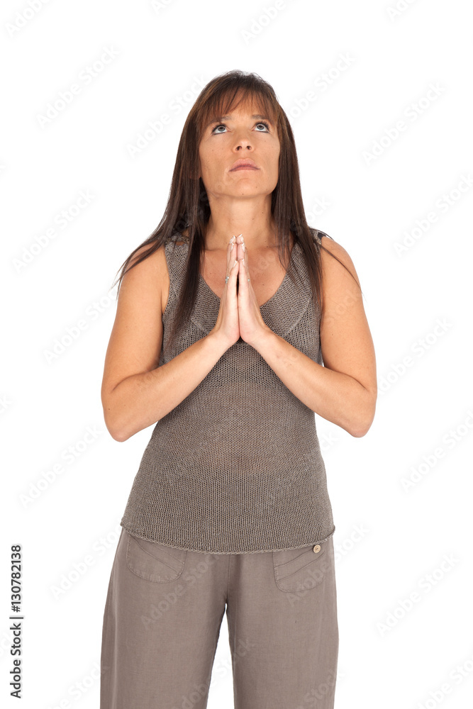 Beautiful woman doing different expressions in different sets of clothes: prayer Beautiful woman doing different expressions in different sets of clothes: prayer