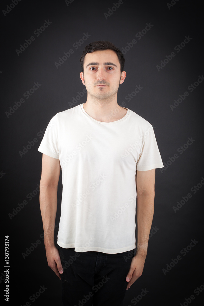Handsome Man doing different expressions in different sets of clothes: at attention Handsome Man doing different expressions in different sets of clothes: at attention