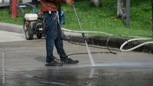 High pressure cleaning
Worker cleaning driveway with high pressure washer 