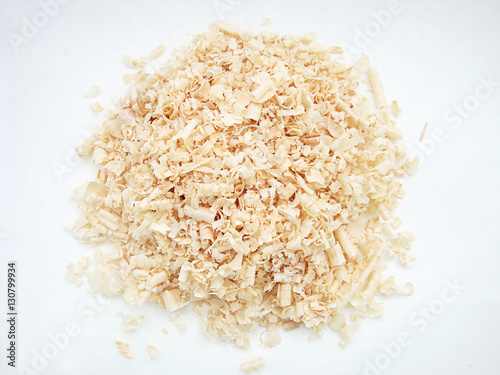 Sawdust wood of different breeds. Pine, oak or ash. Maybe spruce or pine needles.