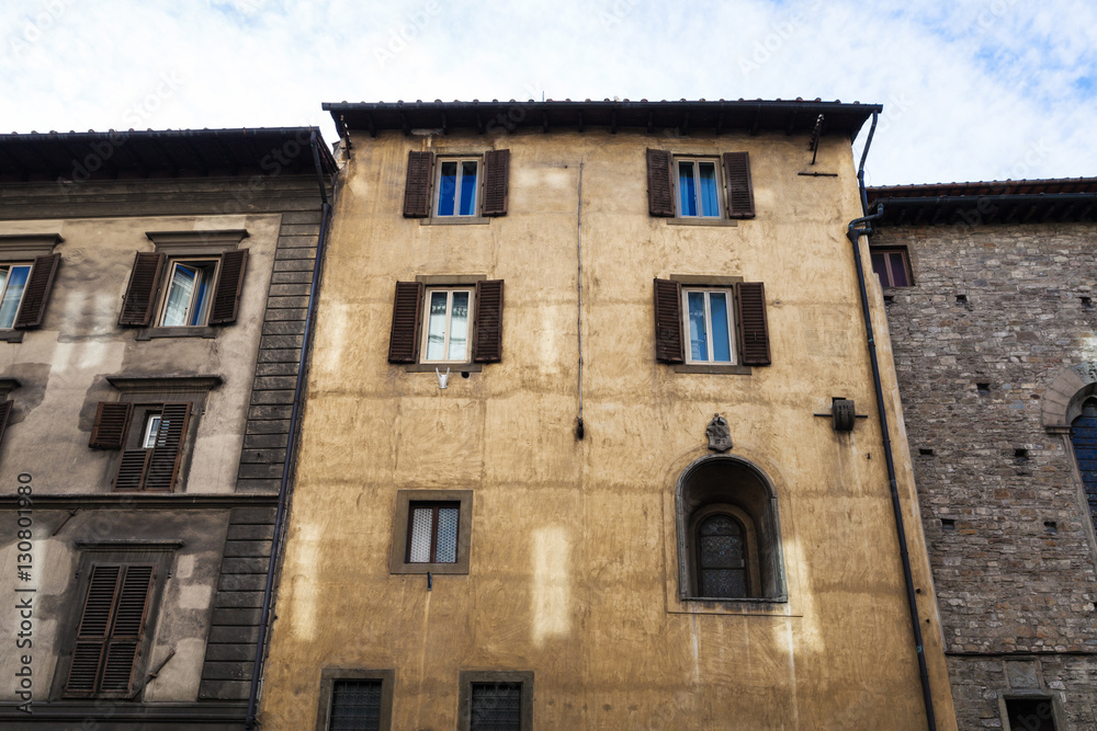 facades of old apartment buildings in Florence