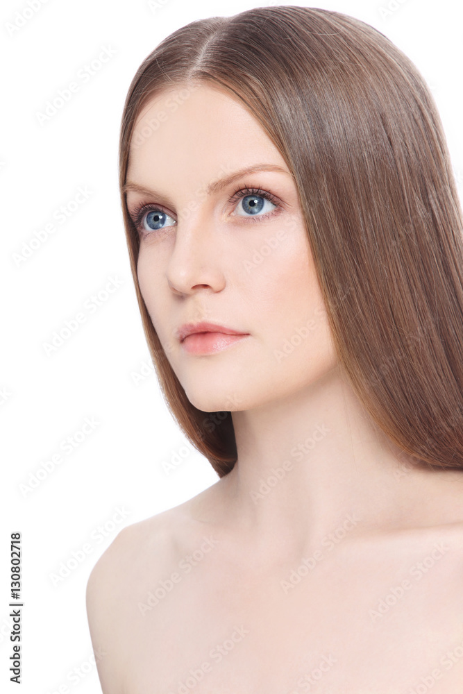 Fototapeta premium Portrait of young healthy beautiful woman with long straight hair and clean face over white background, copy space