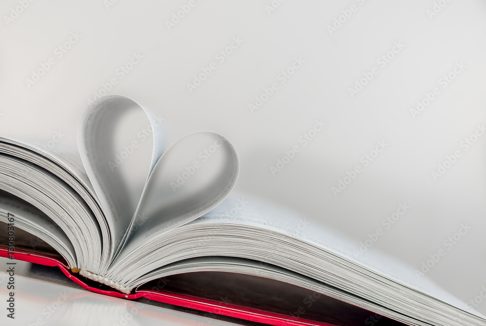 Abstract - paper heart from book sheets - romantic mood Abstract - paper heart from book sheets - romantic mood