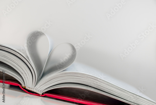 Abstract - paper heart from book sheets - romantic mood
