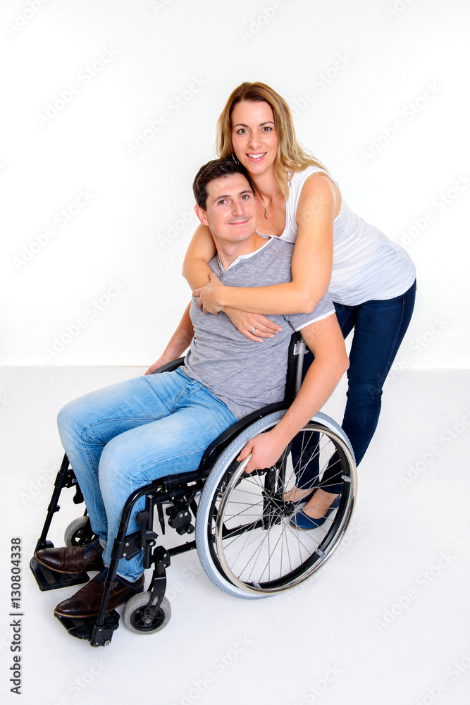 disabled man in wheelchair and his wife disabled man in wheelchair and his wife