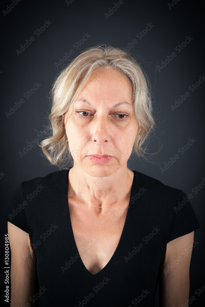 Beautiful woman doing different expressions in different sets of clothes: sad Beautiful woman doing different expressions in different sets of clothes: sad