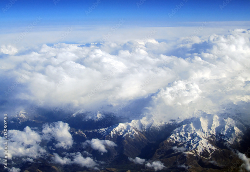 Swss Alps covered in snow - an aerial view from plane Swss Alps covered in snow - an aerial view from plane
