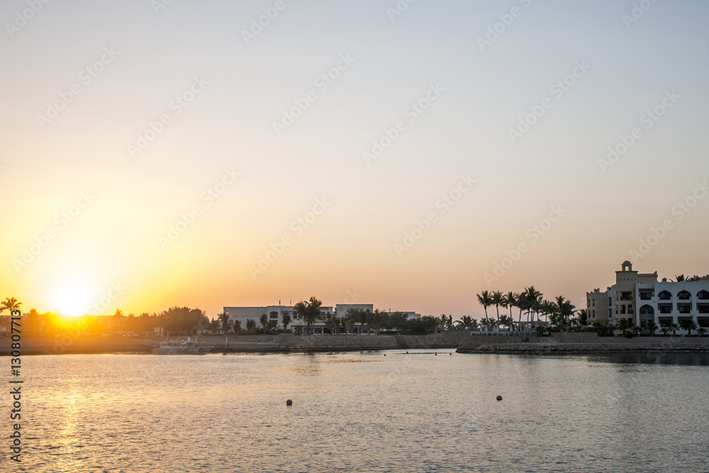 Amazing Sunset Sultanate Oman Souly Bay harbour and Hotels Oceanside