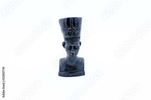 Bust in alabaster of Queen Nefertiti isolated on white background photo