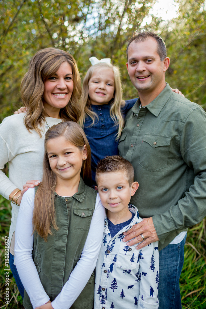 Lifestyle Portrait of a Five Person Family Outdoors