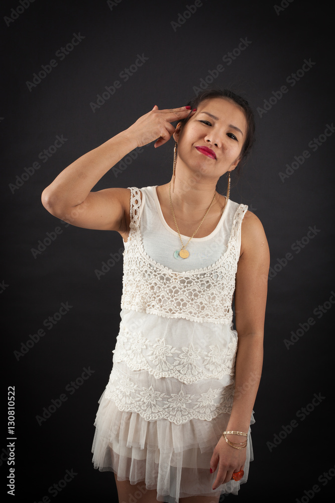 Beautiful woman doing different expressions in different sets of clothes: suicide