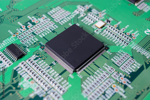 Closeup of electronic circuit board with electronic components b