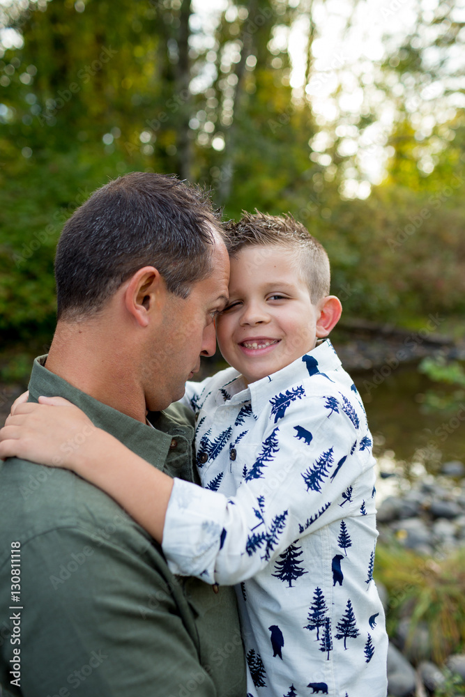 Fototapeta premium Young Boy With Father