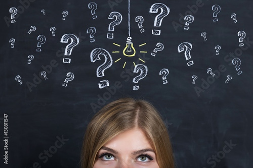 Idea Light Bulb on Blackboard photo