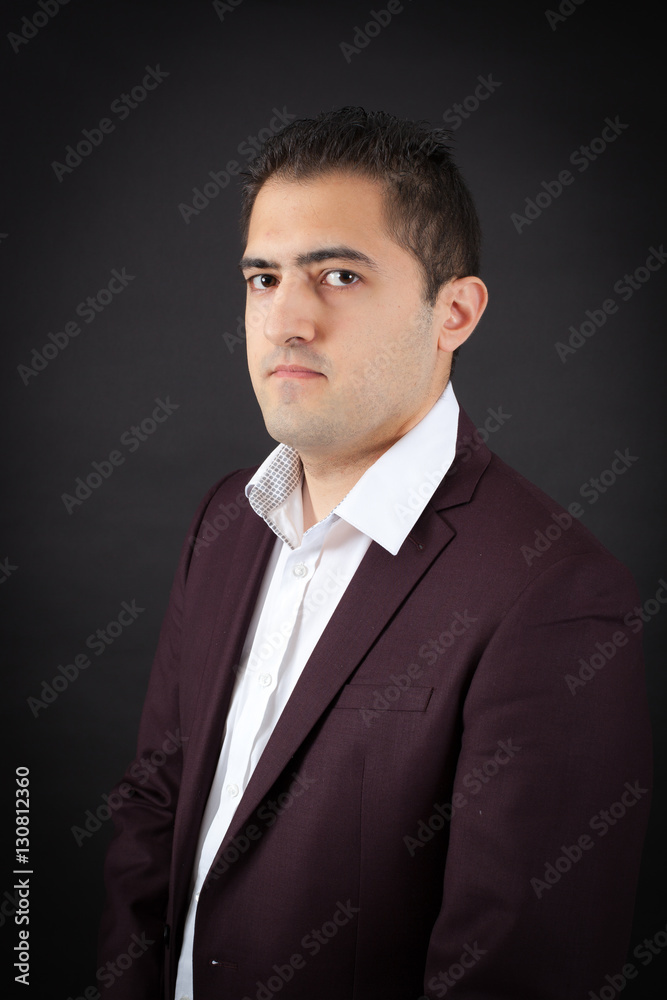 Handsome man doing different expressions in different sets of clothes: thinking