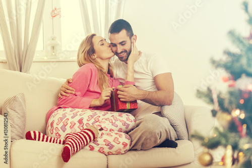 Couple in love with Christmas present