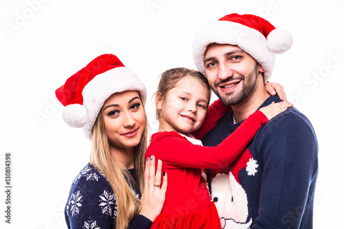 Close up portrait of father  mother and daugher on Christmas holiday. Xmas mood family