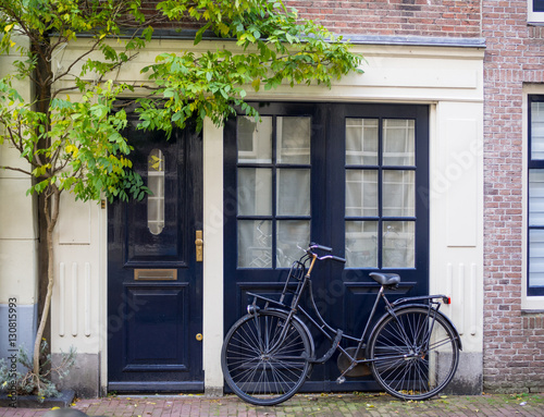 Photography ฺBicycle parking in front of a house