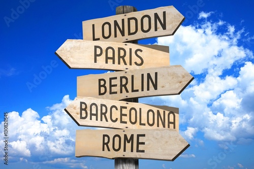 Wooden signpost - capital cities  London  Paris  Berlin  Barcelona  Rome  - great for topics like traveling etc.