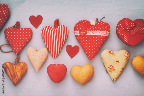 Valentines day background. Various of wooden and fabric hearts