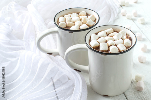 Hot chocolate with marshmallow in white mug