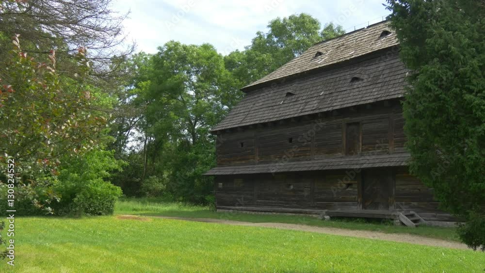 High Old Building is Completely Built of Wood - it is an Architectural Monument, Which is an Example of Ancient Polish Architecture High Old Building is Completely Built of Wood - it is an Architectural Monument, Which is an Example of Ancient Polish Architecture