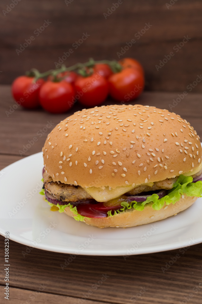 Burger of homemade close up on wooden background. Top view. - Burger of homemade close up on wooden background. Top view. -