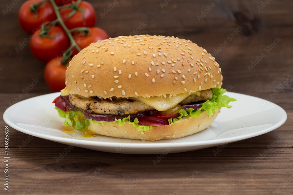 Burger of homemade close up on wooden background. Top view. - Burger of homemade close up on wooden background. Top view. -