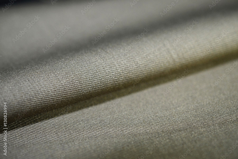 close up roll texture brown gold fabric of suit close up roll texture brown gold fabric of suit