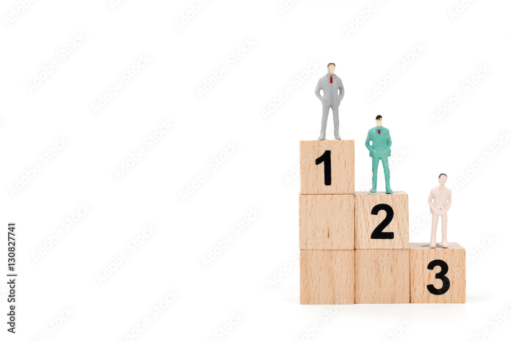 Group of miniature businessman on white background Group of miniature businessman on white background