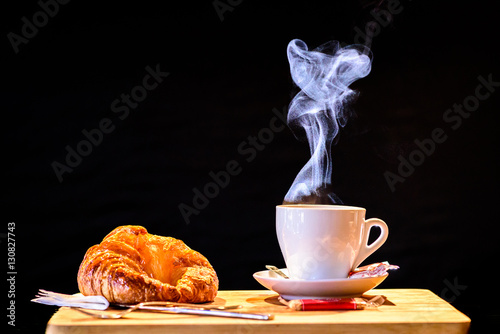 Coffee and croissant photo