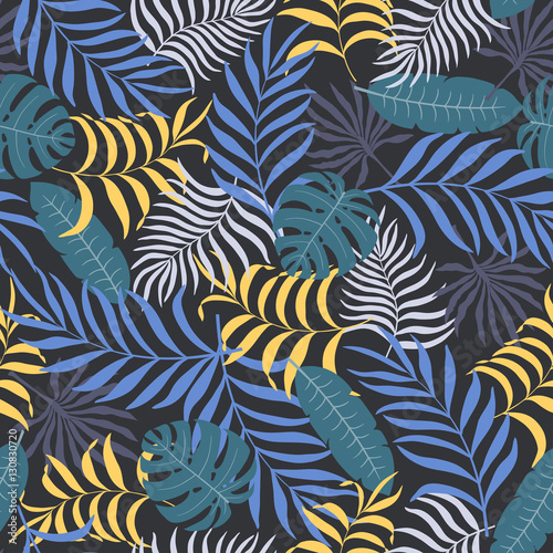 Seamless pattern with hand-drawn tropical leaves