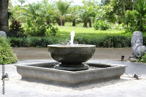 Ceramic basin fountain in the park.